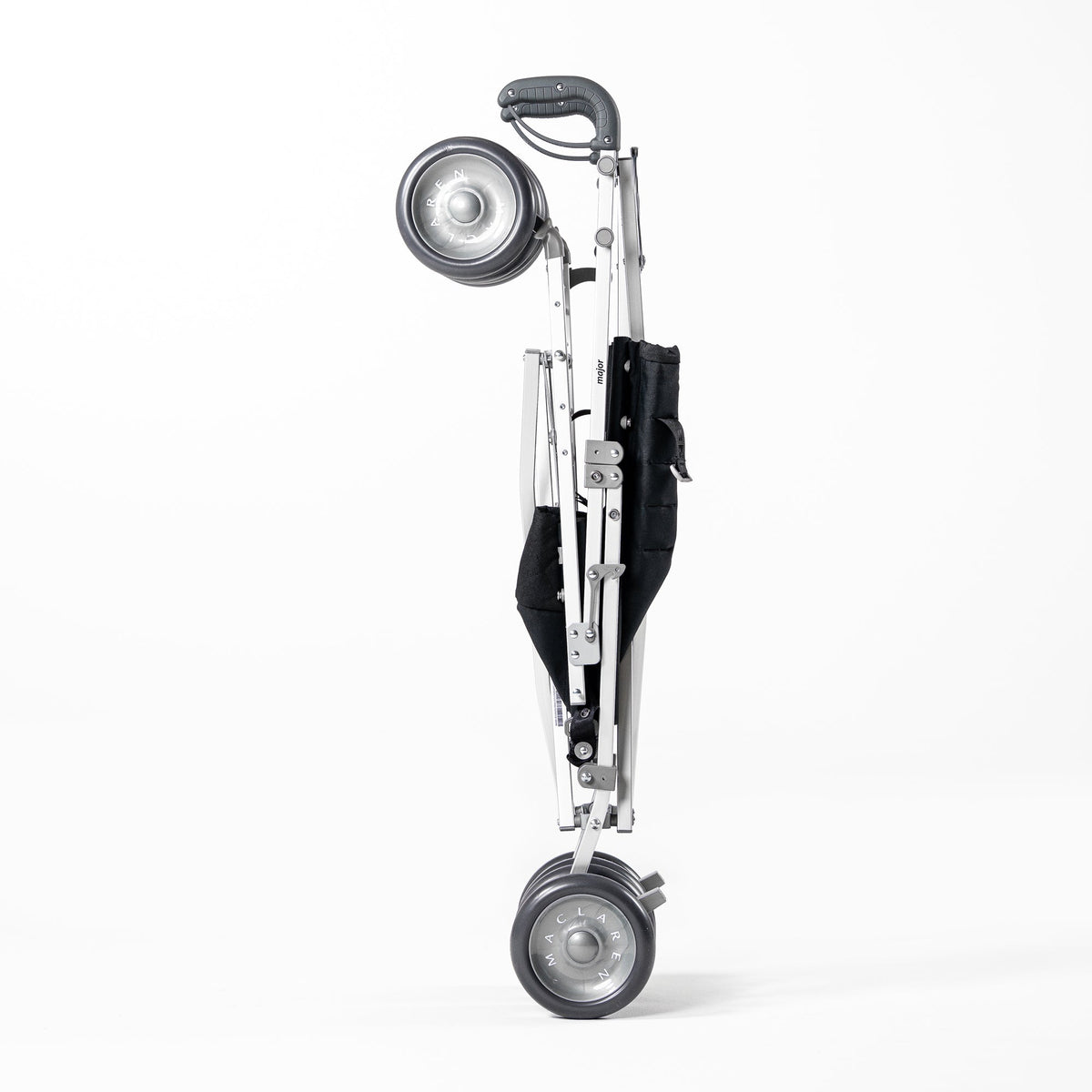 Black Maclaren Major Elite special needs stroller folded for transport