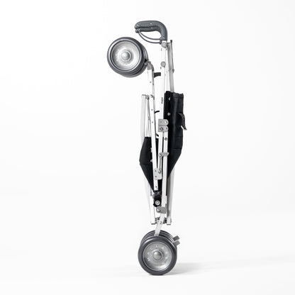 Black Maclaren Major Elite special needs stroller folded for transport
