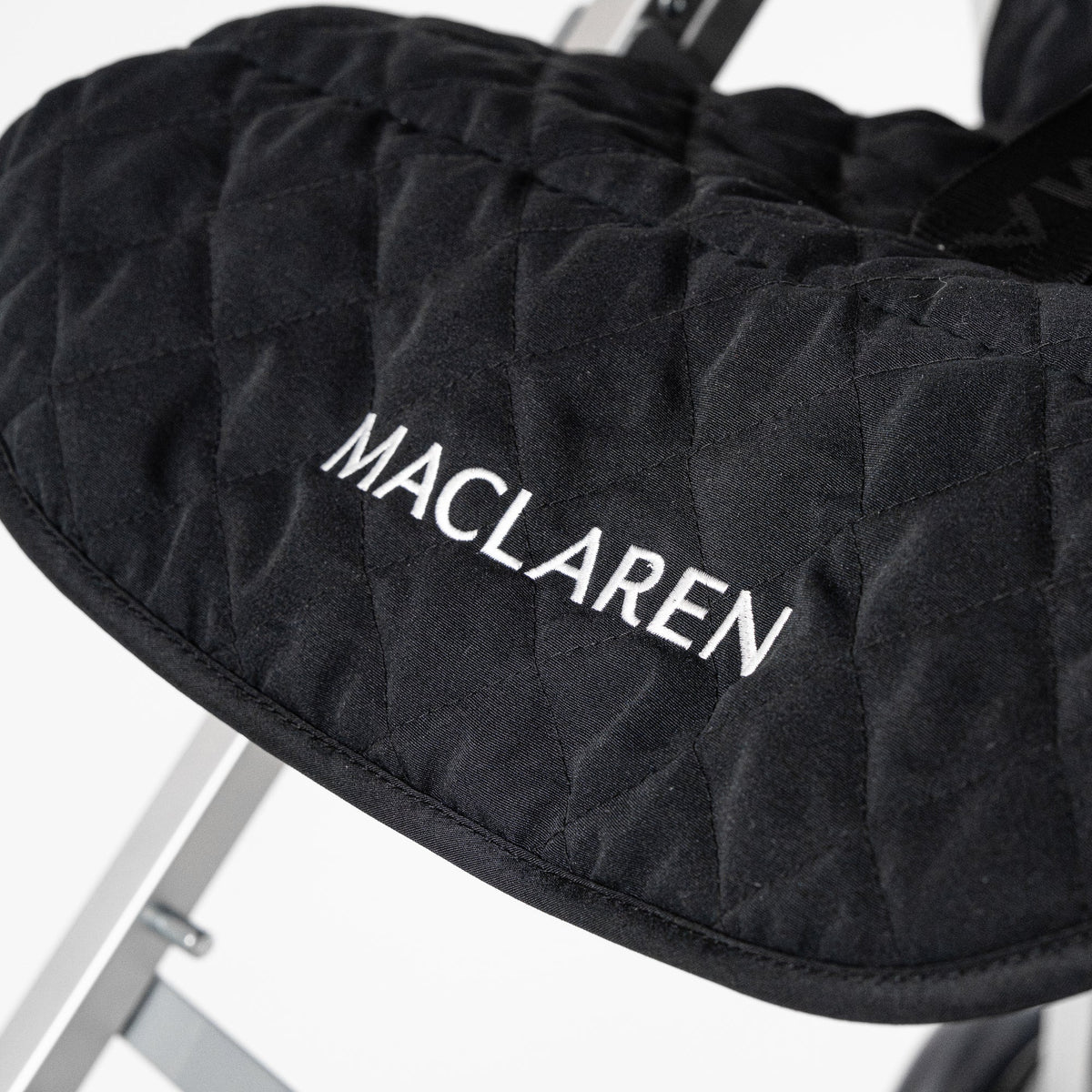 Black Maclaren Major Elite padded seat liner, front view